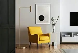 yellow chair in living room created in photorealistic CGI